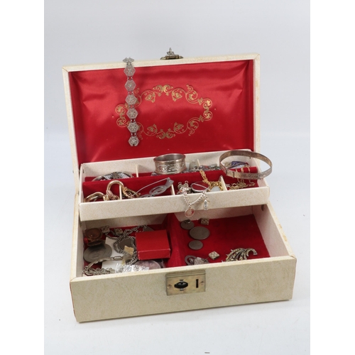 123 - A rexine jewellery box containing silver bracelet, costume jewellery etc