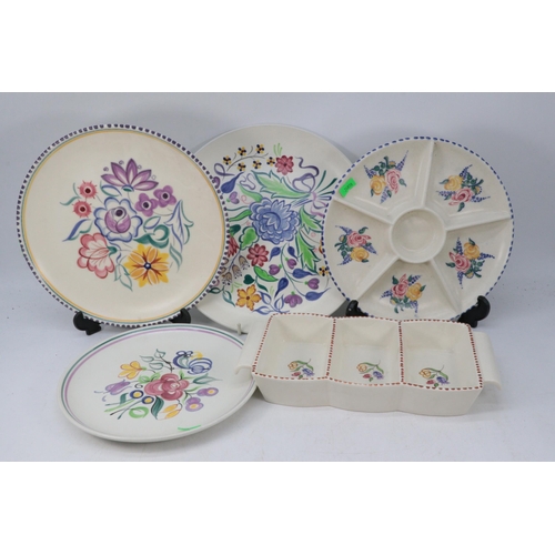 496 - A quantity of Poole Pottery white bodied items to include a TV pattern cheese dish etc