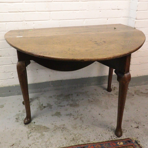 503 - Antique gateleg table on cabriole feet. One leaf has come away from the hinge. Needs some attention.