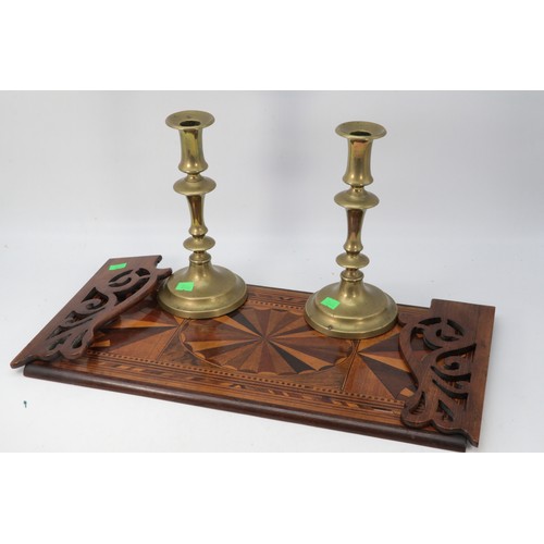 567 - Pair of Antique brass candlesticks together with a decoratively inlaid bookstand?