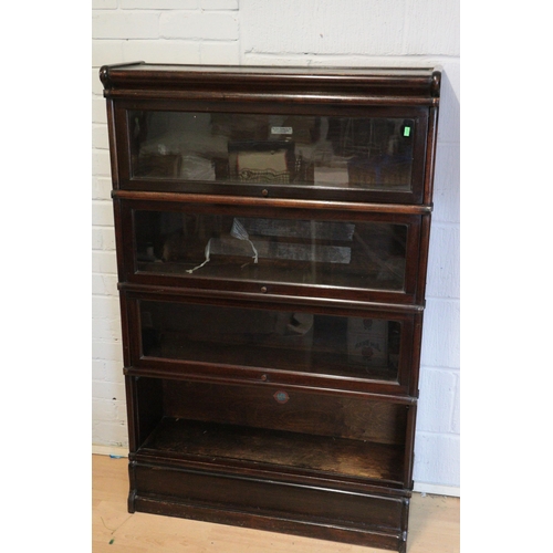 627 - Four tier globe Wernicke bookcase. The bottom section is missing the door.  measures approx. W87cm x... 