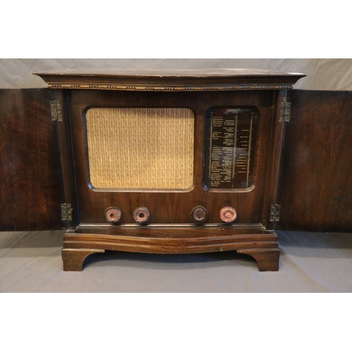 348 - A Pamphonic Radio housed in a small cabinet purpose fitted. trade/spares/repairs