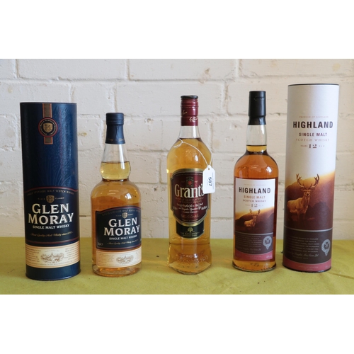 587 - A boxed Glenmoray, together with a Grants and a boxed Higland Single Malt Whisky. We cannot guarante... 