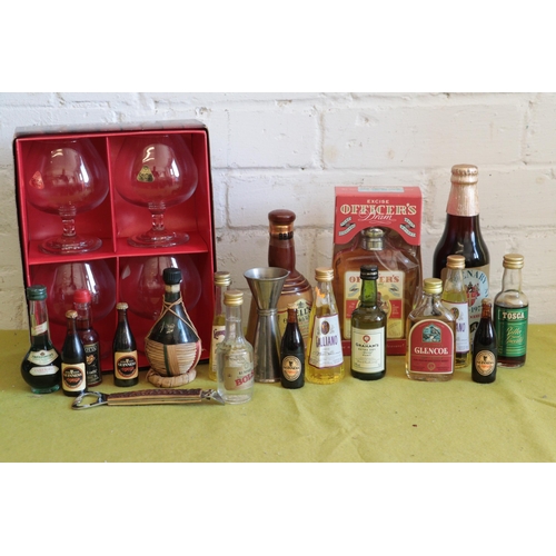 601 - Boxed Daufine set of 4 brandy glasses together with a selection of alcohol miniatures. We cannot gua... 