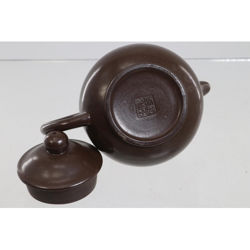 9 - Miniature clay Yixing teapot with character marks to base. Size approx 3inches