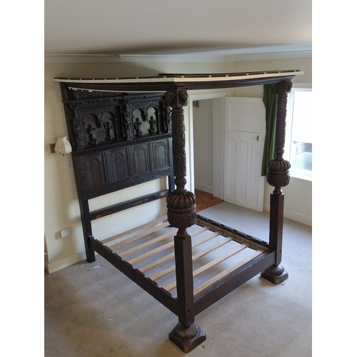 75 - Antique four poster bed with heavily carved decorated headboard, pillars and top measures approx 210... 