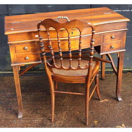 104 - Reproduction Antique style desk with chair. The desk measures approx. 106W x 57D x 85cmH