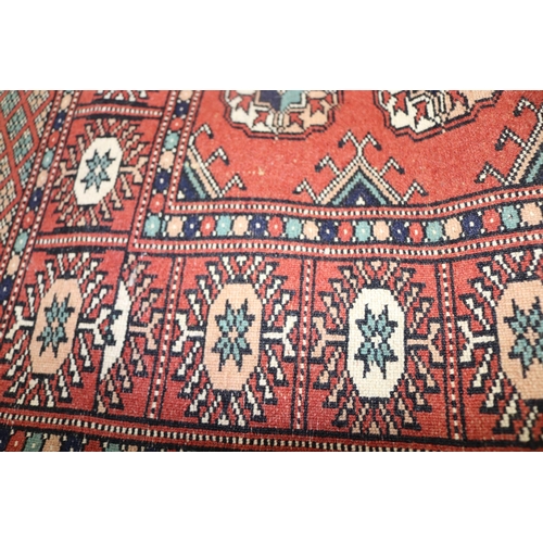 109 - Two small persian floor rugs.