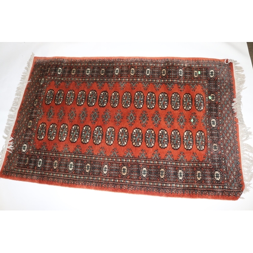 109 - Two small persian floor rugs.