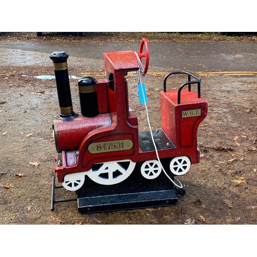 5 - A coin operated red children's train ride. Has seen working and functioning. Sold as a collectable a... 