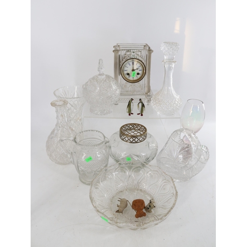 296A - A large quantity of assorted cutglass, pressed glass together with a unusual glass cased mantle cloc... 