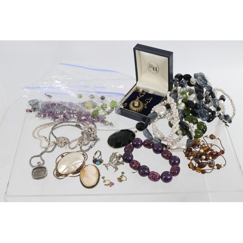 20A - Selection of costume jewellery together with a selection of evening bags