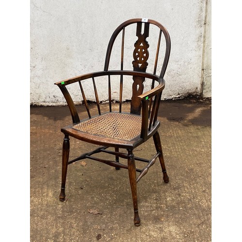 88 - Antique Windsor elbow chair with begere seat, The begere is torn.