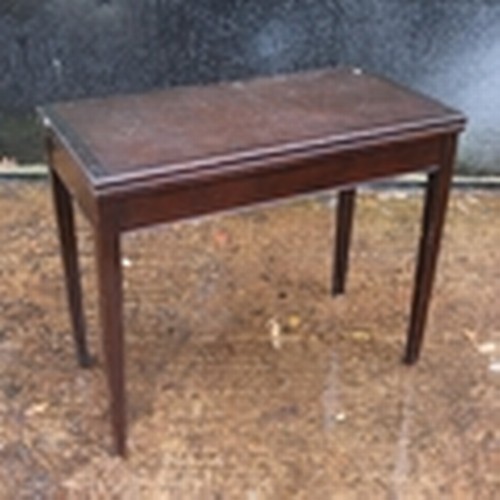 85 - Fold over card table (measures approx. W92cm x D92cm x H72cm) together with a stool with a worn Wels... 