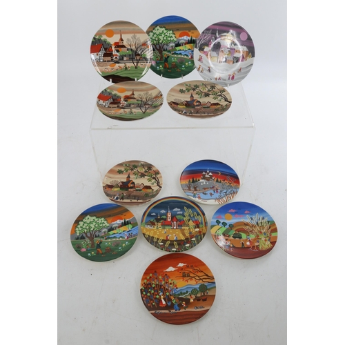 160A - Eleven Poole Pottery decorative collectors plates, quantity of candy Poole Pottery etc