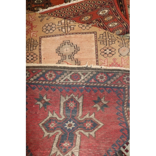 216 - Four vintage persian style rugs