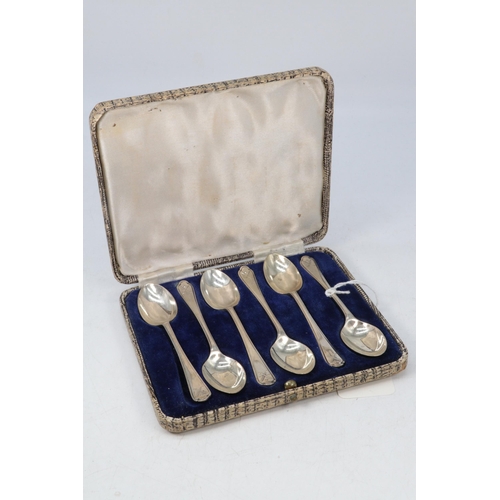 11 - Cased set of six silver spoons (approx. 80g) together with cased set of plated floral engraved servi... 