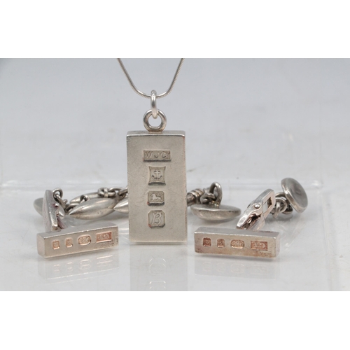16 - A silver ingot on chain, together with a similar pair of Ingot cufflinks and two other sets of cuffl... 
