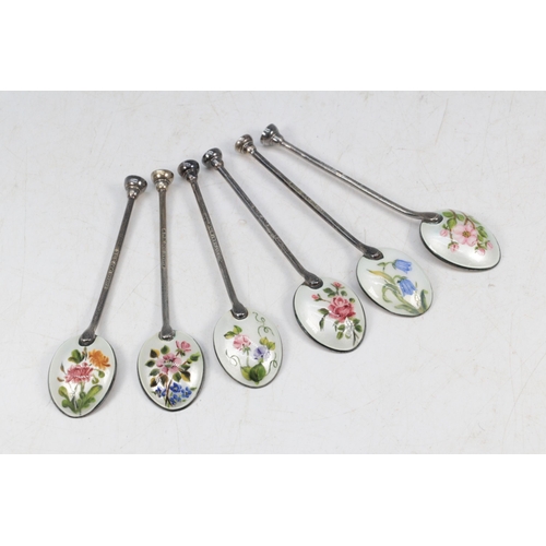 128 - Six hallmarked teaspoons decorated floral enamelled bowls