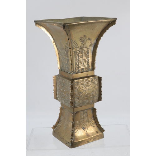 189 - An Oriental brass vase