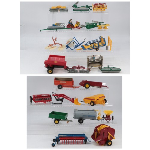 209 - Good selection of Britains farm implements and tractor accessories