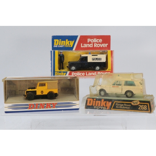 238 - Dinky toys boxed 277 police land rover together with a Dinky 268 range rover (cellophane perished) a... 