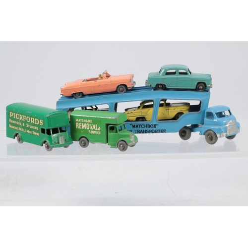 254 - Lesney car transporter with four Lesney vehicles and two removal lorries