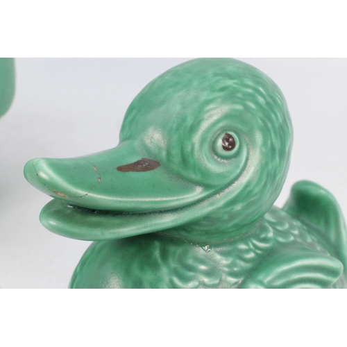 317 - Sylvac 1028 green glazed rabbit together with a 1492 duck which has been repaired