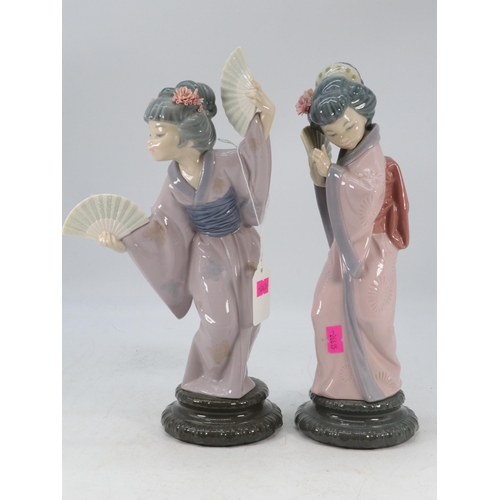 318 - A pair of Lladro oriental lady figurines