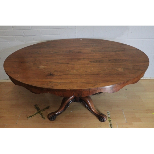 334 - Antique Rosewood tilt top breakfast table (measures approx. L144cm x W102cm)