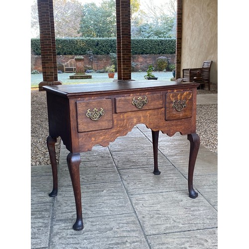 385 - 19th Century antique oak lowboy on cabriole legs