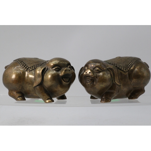 403 - Pair of Chinese bronze pigs