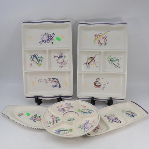 416 - Two Poole Pottery decorative hors d'oeuvres trays, sectional plate, two lamps (trade/spares/repair) ... 