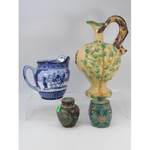 438 - Antique Majolica jug with grotesque handle and floral decoration together with a Doulton jug, a Japa... 