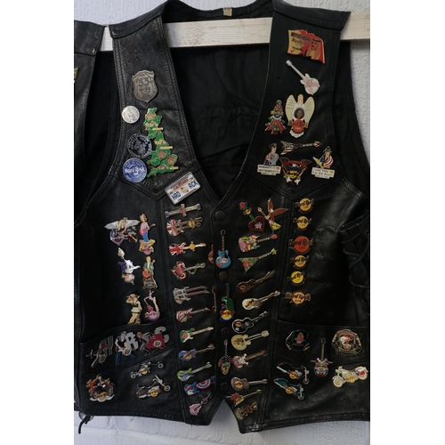 190A - Leather Bikers jacket full of assorted Hard Rock café badges.
Badges included are opening day pins f... 