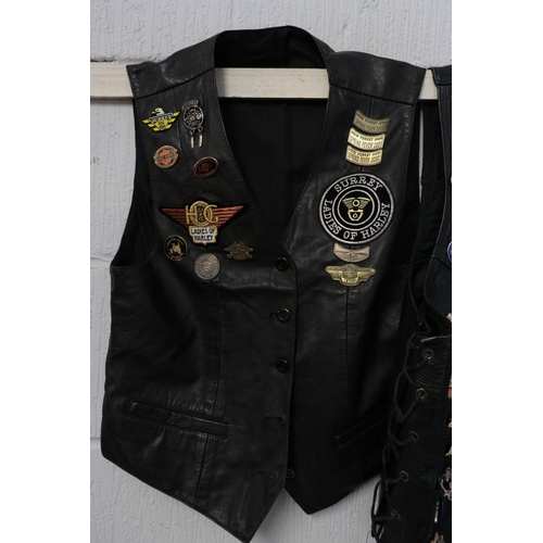 190A - Leather Bikers jacket full of assorted Hard Rock café badges.
Badges included are opening day pins f... 