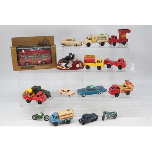 234 - A selection of vintage and later tinplate vehicles and others