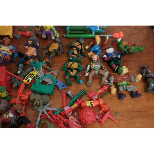 337 - A large quantity of teenage mutant ninja turtles including the party bus (1989), helicopter, figures... 