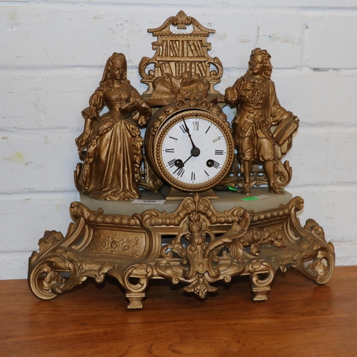 399 - Gilt Spelter mantle clock missing back legs in need of some attention