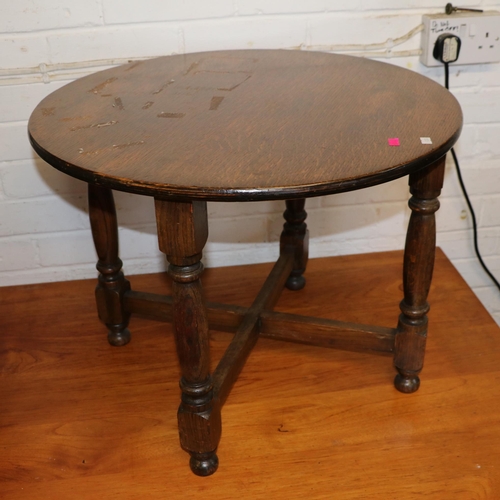 411 - Ebonised antique plank topped, tilt side table together with a circular oak table