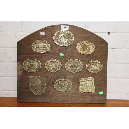 443 - A selection of steam rally brass plaques fixed to a ply board to include Holton working steam rally ... 