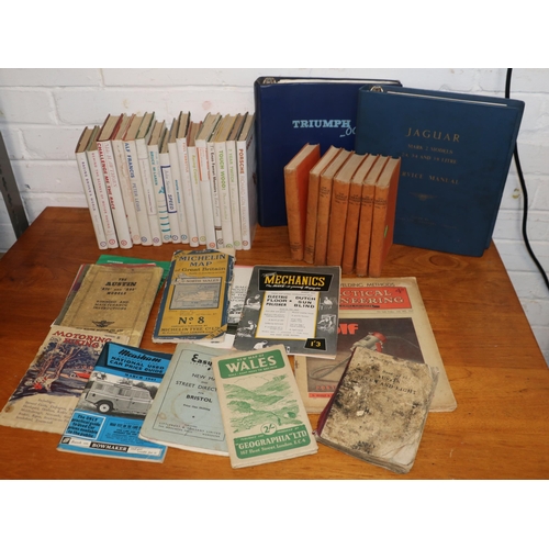 445 - A selection of motoring interest books to include Jaguar service manual for MkII models, Triumph 200... 