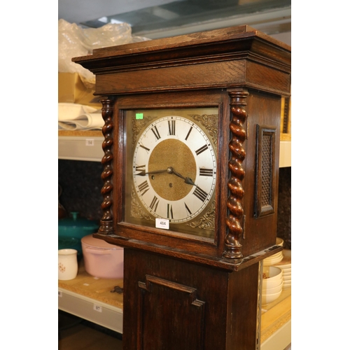 484 - Oak cased early 20c Longcase clock with chiming movement and square brass face.