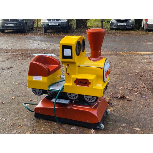 41 - A coin operated yellow children's train ride. Has been seen working and functioning. Sold as a colle... 