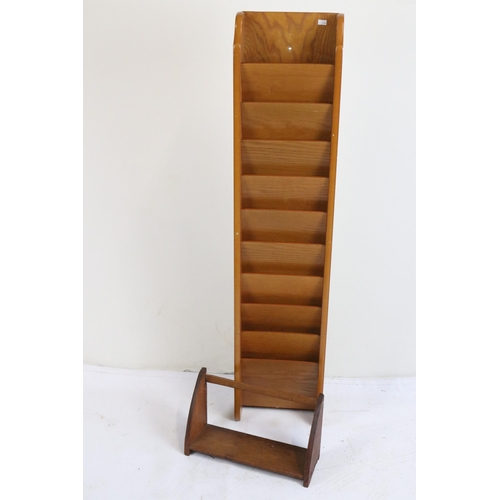 88 - Wall mounted magazine rack together with a similar desk top stationary stand