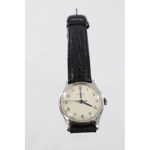 6 - Vintage Longines gents wristwatch on black leather strap, wind up. Has been running but not tested o... 