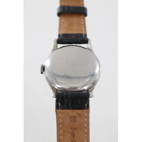 6 - Vintage Longines gents wristwatch on black leather strap, wind up. Has been running but not tested o... 