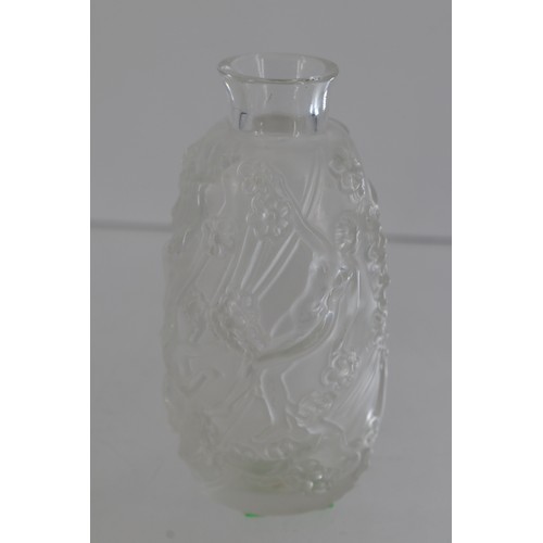 9 - Lalique art glass vase approx. 10cms tall. Decorated with nudes entwined with vines and flowers.