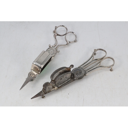 15 - Two antique pairs of Candle snuffer, scissors. One with wick cutter