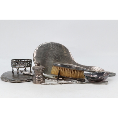 29 - Two silver backed mirrors, silver hairbrush, silver handled boot pull and shoe horn, a silver pusher... 